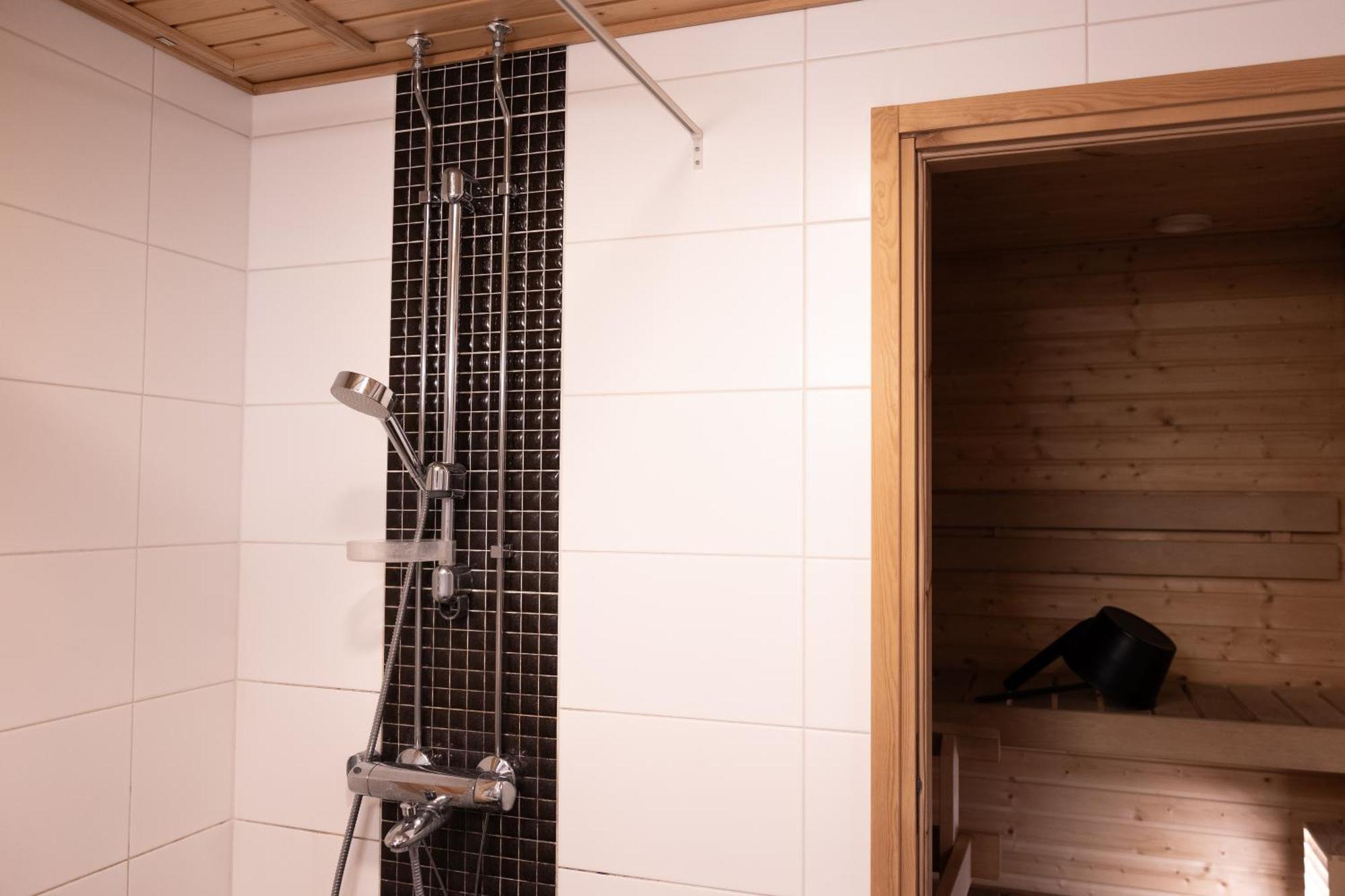Aurora Paroni Suite With Sauna โรวานิเอมิ ภายนอก รูปภาพ